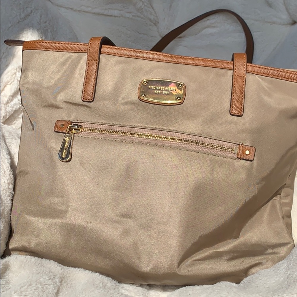 Tan Michael Kors Medium zippered tote handbag